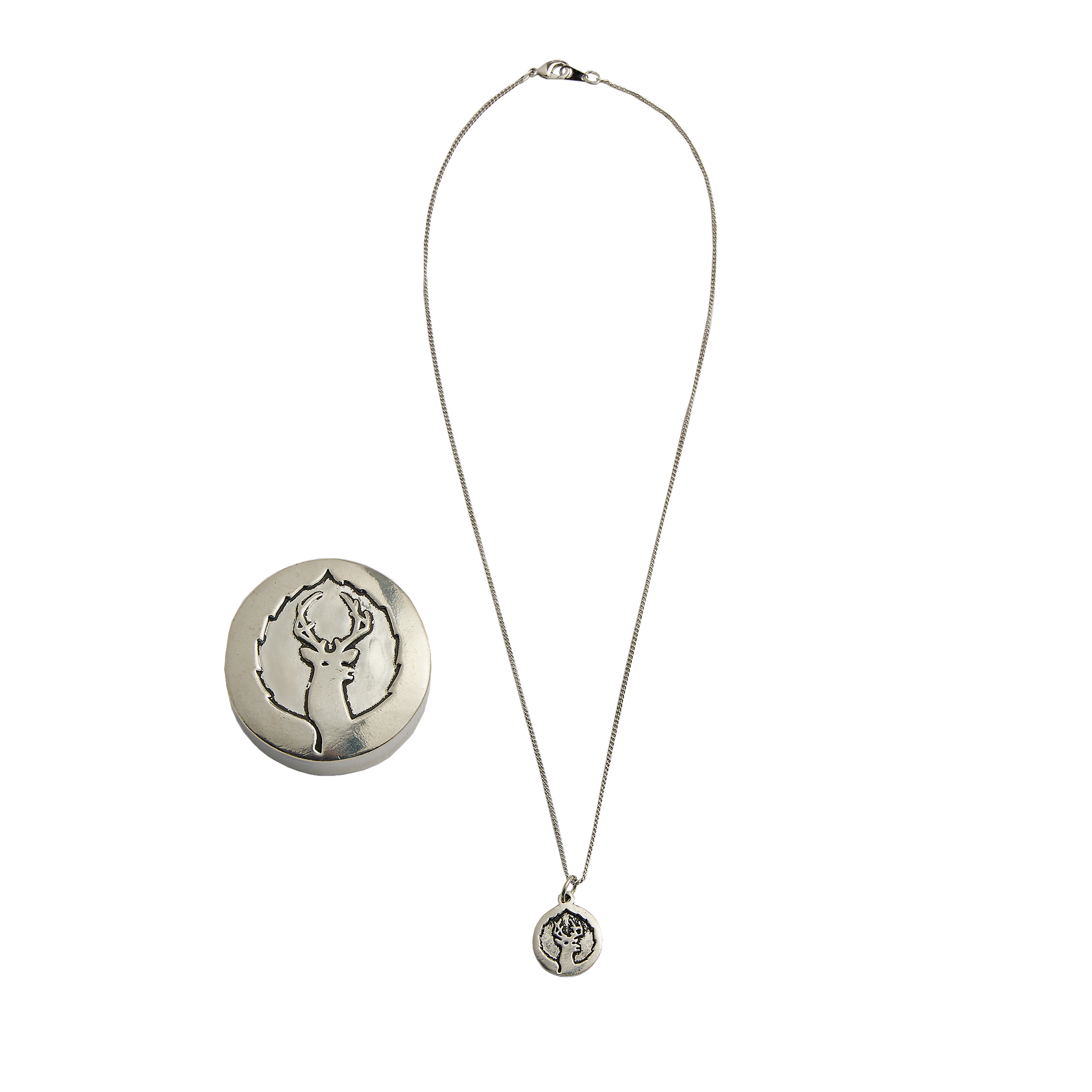 Pewter necklace of deer valleys logo with a wishbox side by side
